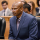 In a June 1, 2017 file photo, Desmond Ricks listens to Judge Richard Skutt during a hearing in Detroit. The city of Detroit agreed, July 12, 2022, to pay $7.5 million to settle a lawsuit by Ricks who claimed police switched bullets to pin a murder on him in 1992. Ricks was released from prison in 2017 after 25 years, thanks to gun experts, law students at the University of Michigan and his unwavering insistence that he was innocent.